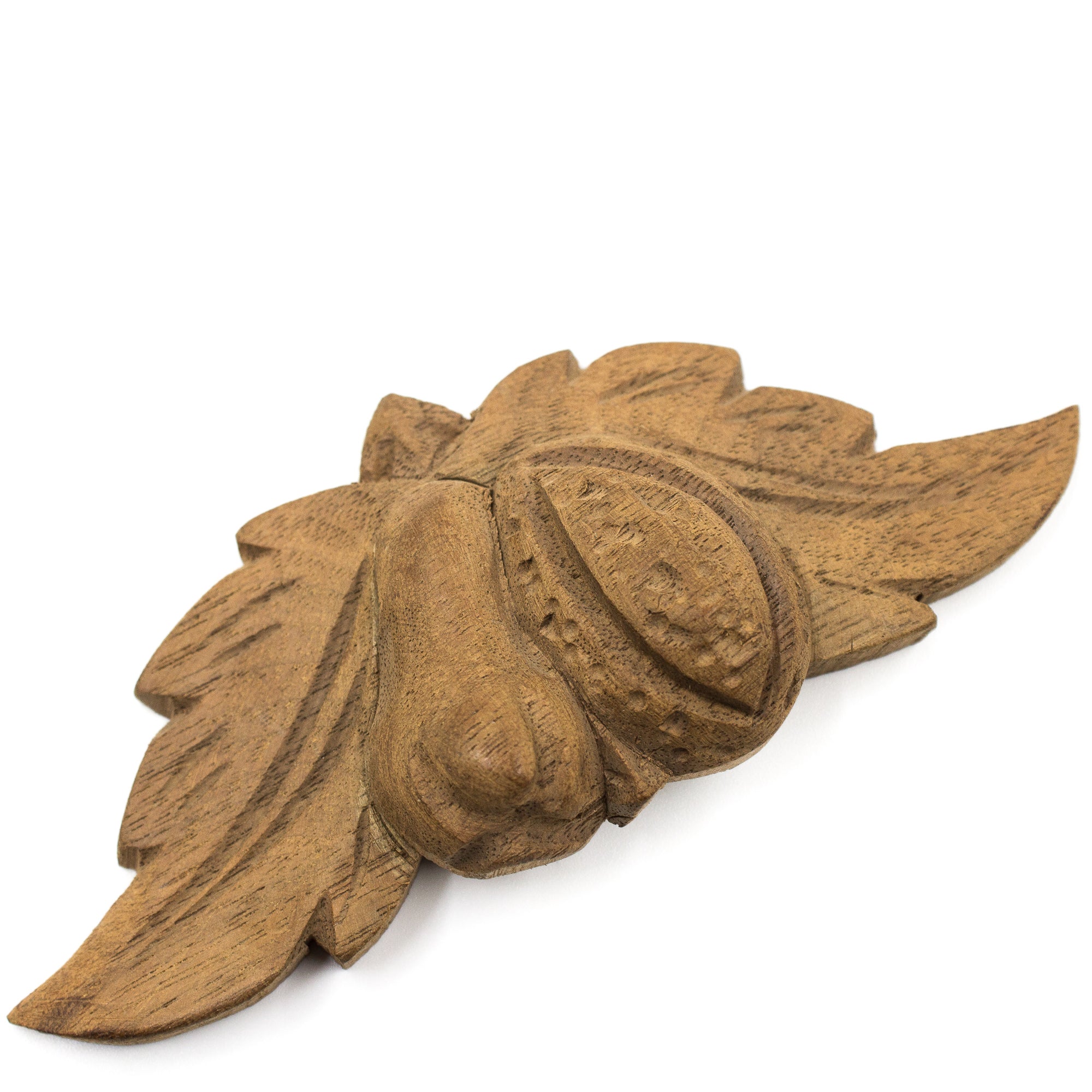 this is an antique vintage carved wood applique for a dresser drawer