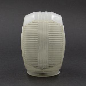 this is a picture of the front of a vintage white glass sconce shade