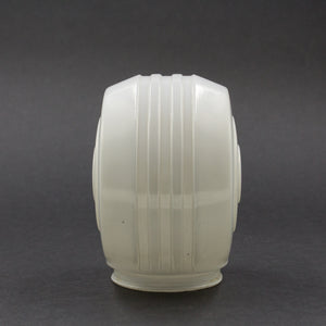 this is a picture of the back of a vintage white glass sconce shade