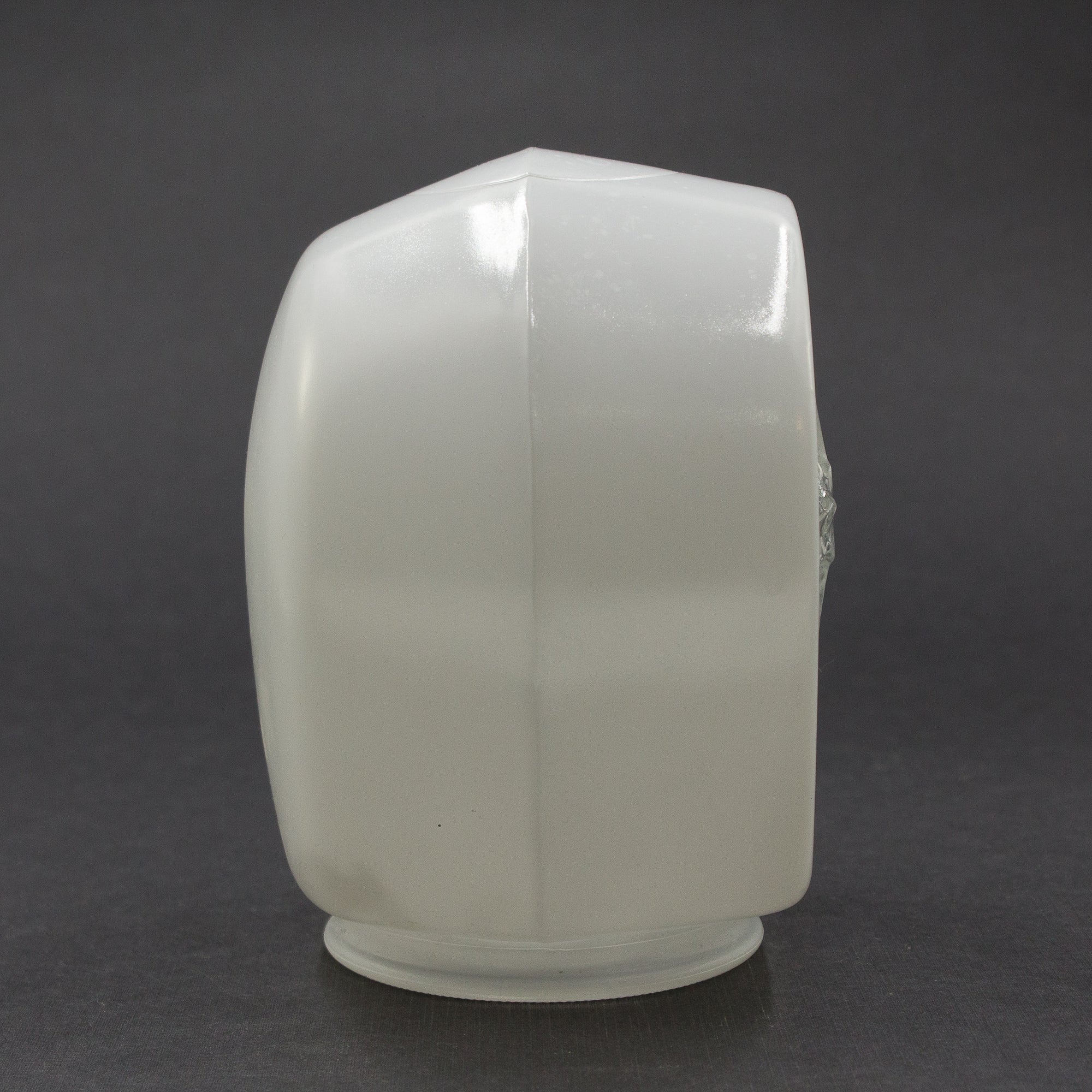 this is a picture of the side of a vintage mid century white glass sconce shade