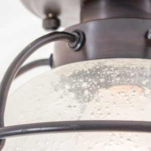 this picture shows the detail on a vintage glass shade that goes with the lantern shaped ceiling fixture