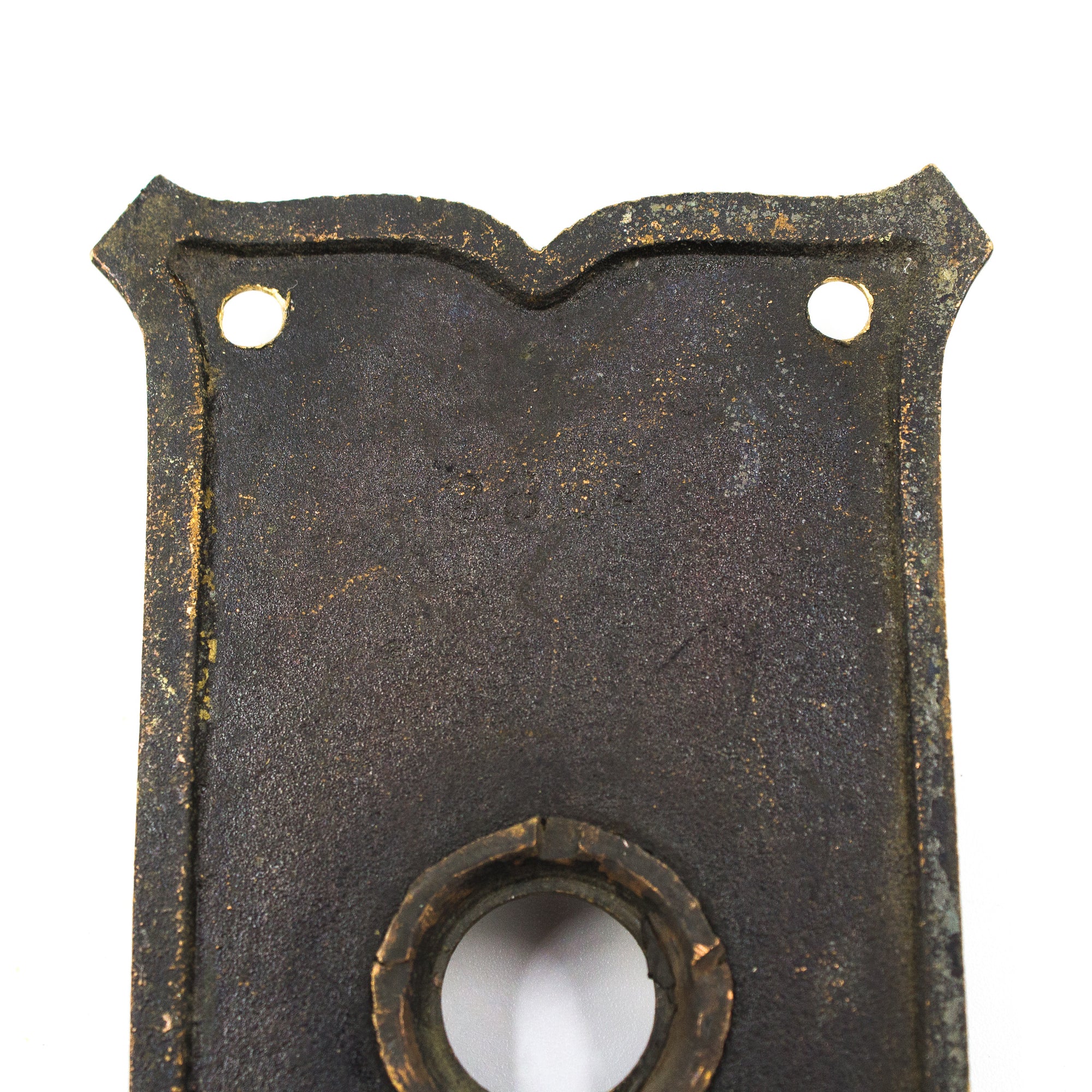 this is a picture of the back of a vintage escutcheon 