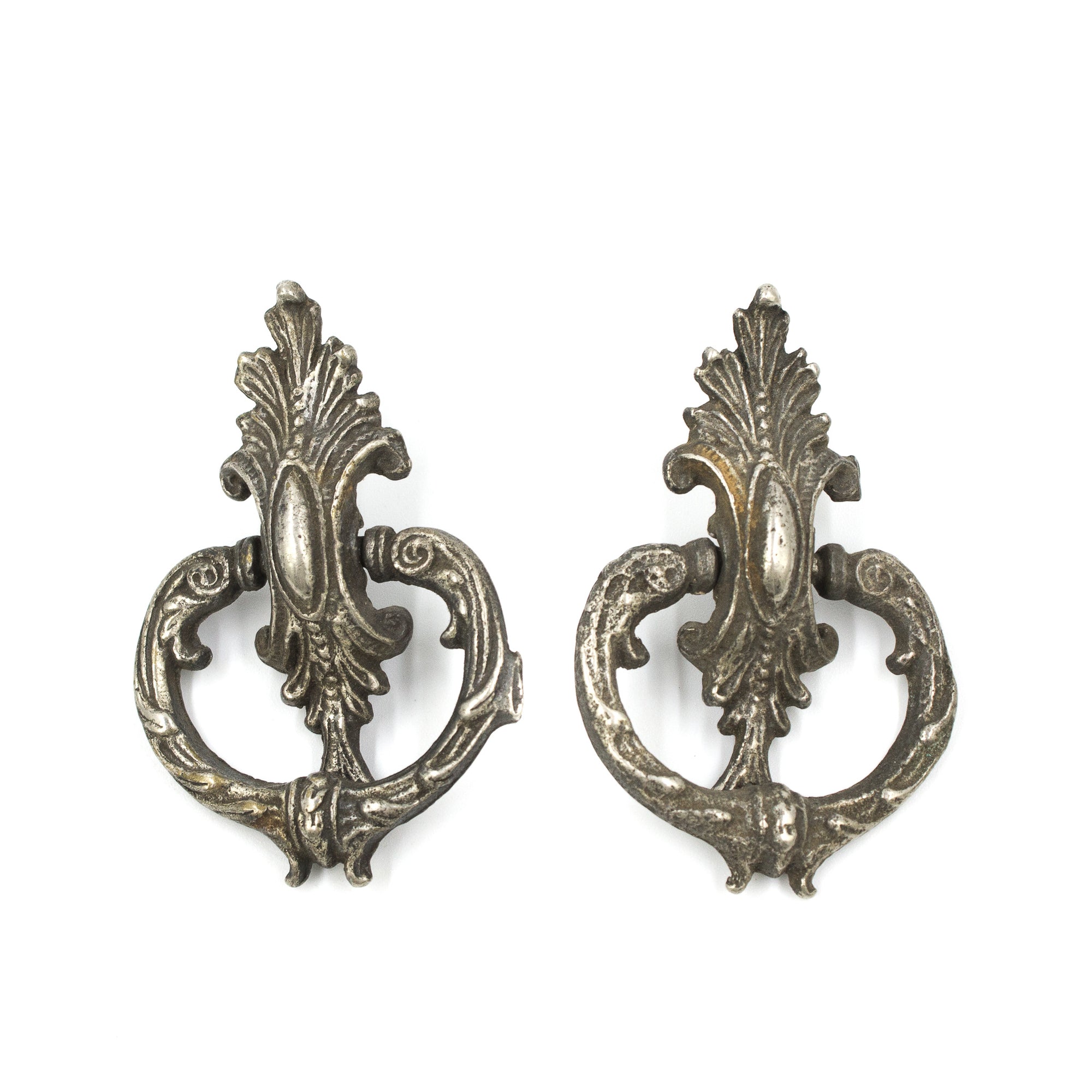 this is a pair of two antique pewter colored ring pulls