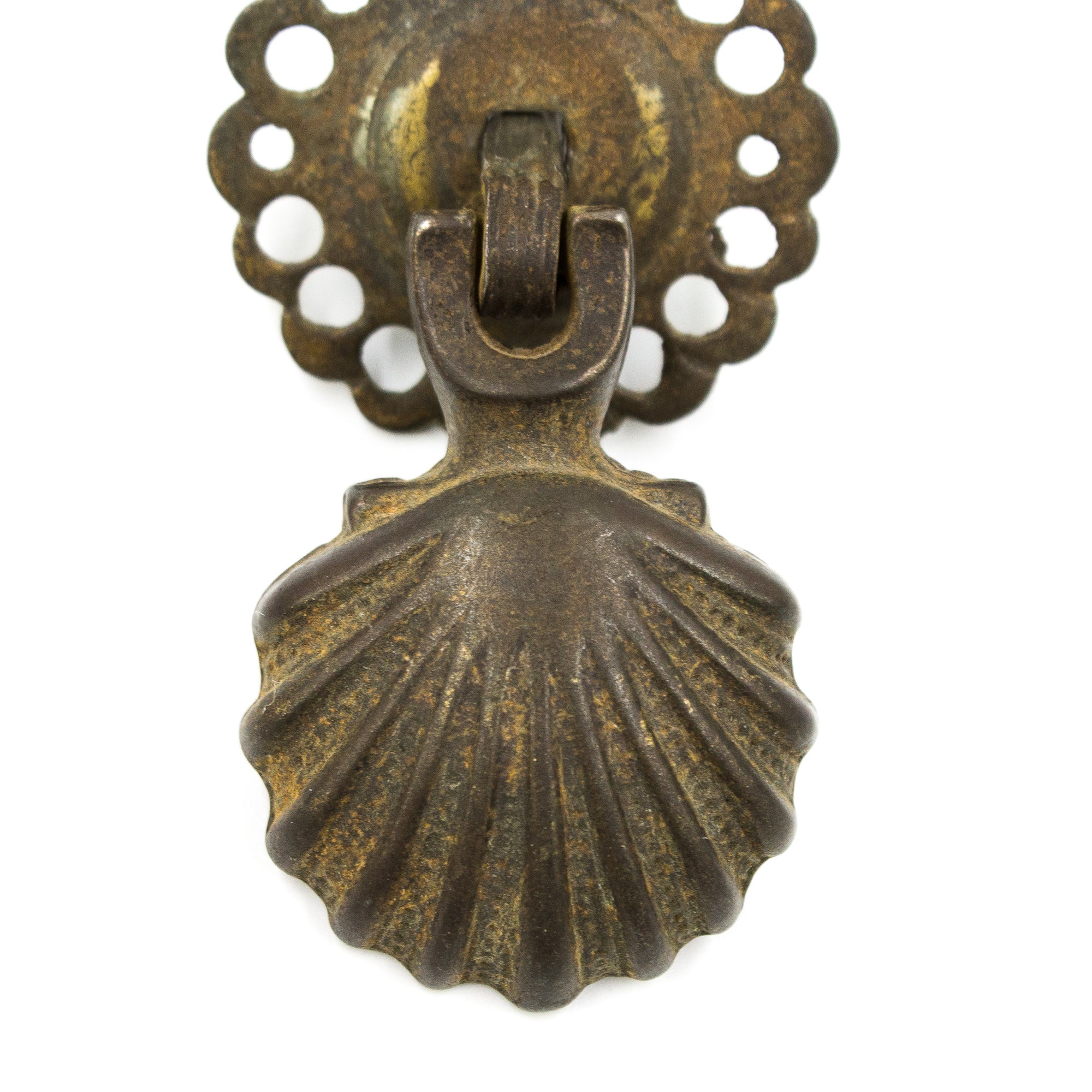 this is an antique drop pull in the shape of a shell