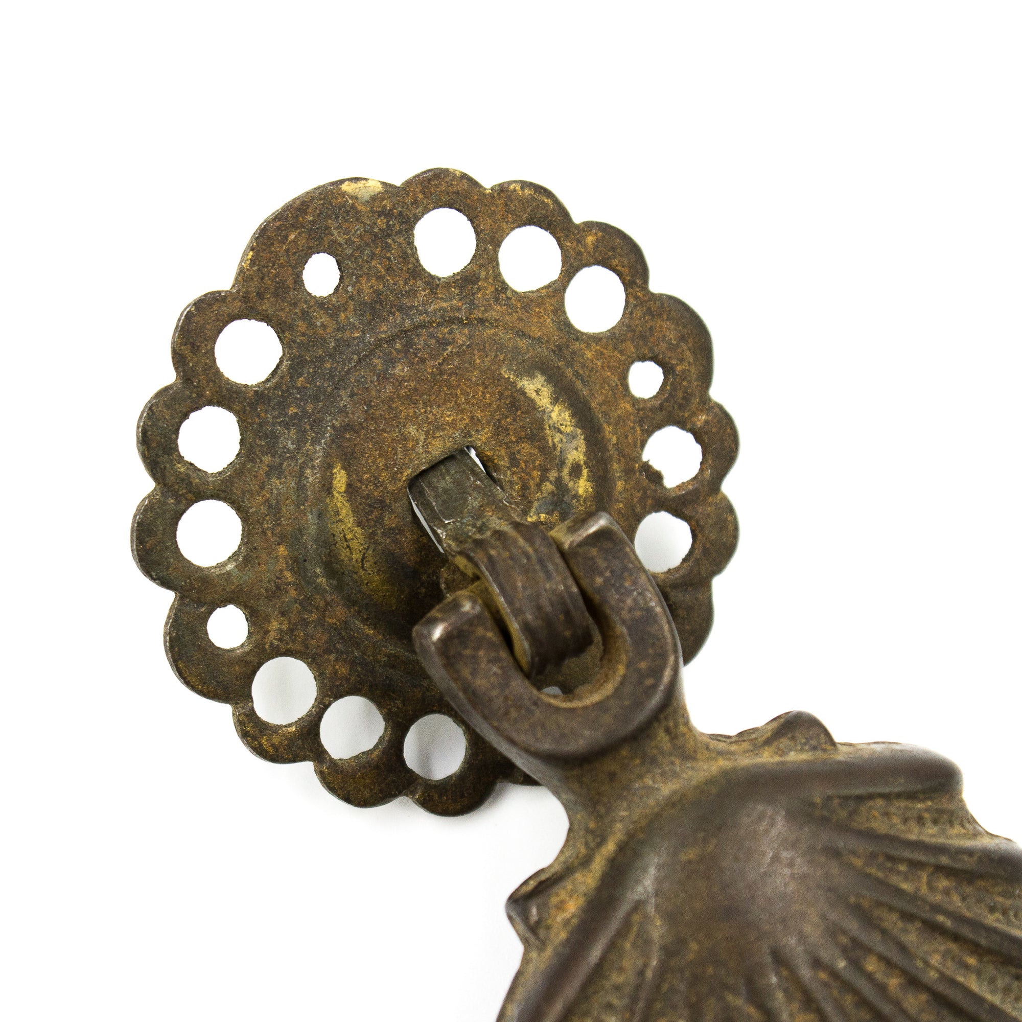 this is an up close picture of the base of an antique drop pull