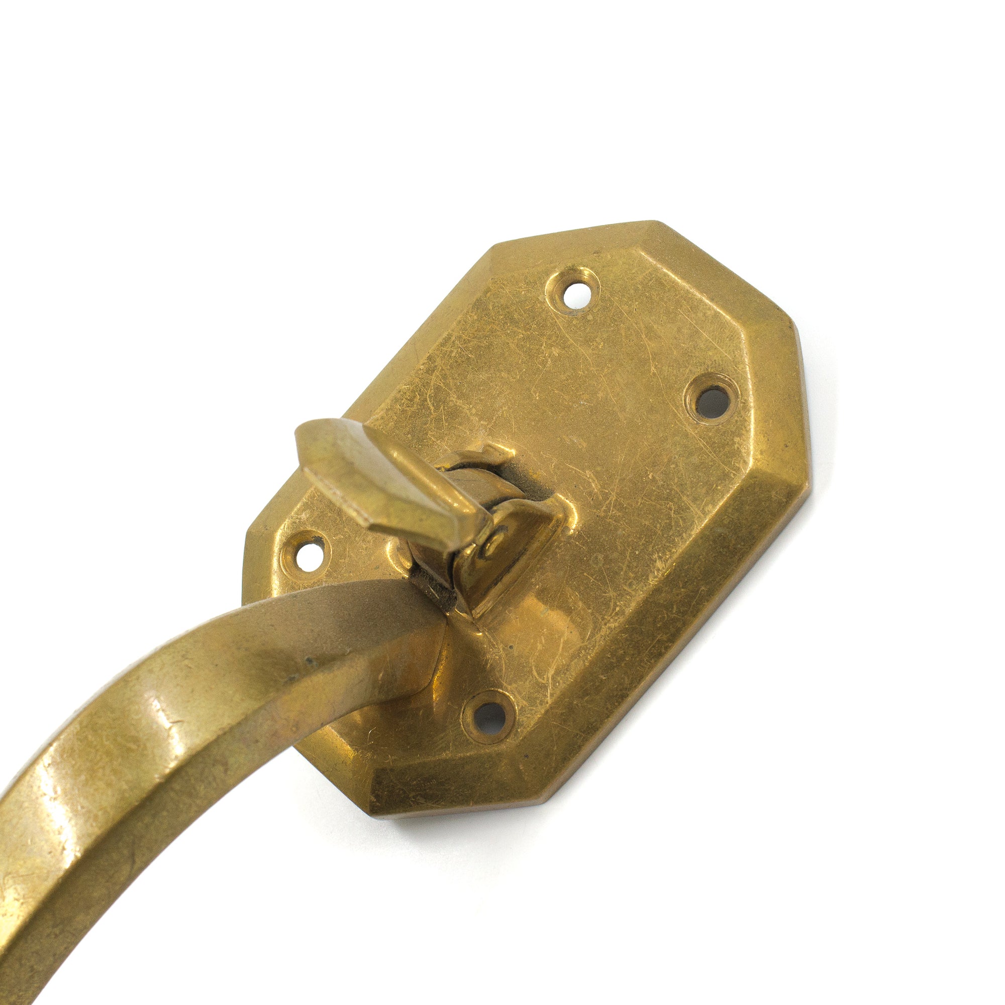 this is a picture of a vintage art deco brass pitcher pull showing the top base and thumb latch