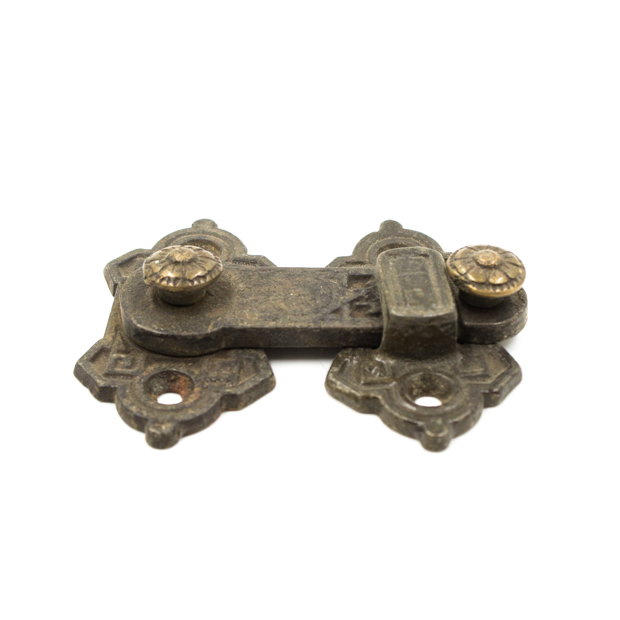 this is a profile view of an antique victorian window latch