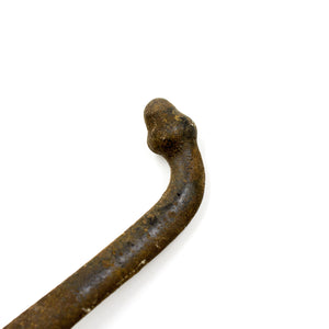 this is a close up picture of the end of a double acorn hook