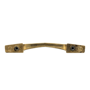 this is a bottom view of a vintage bronze cabinet or drawer pull