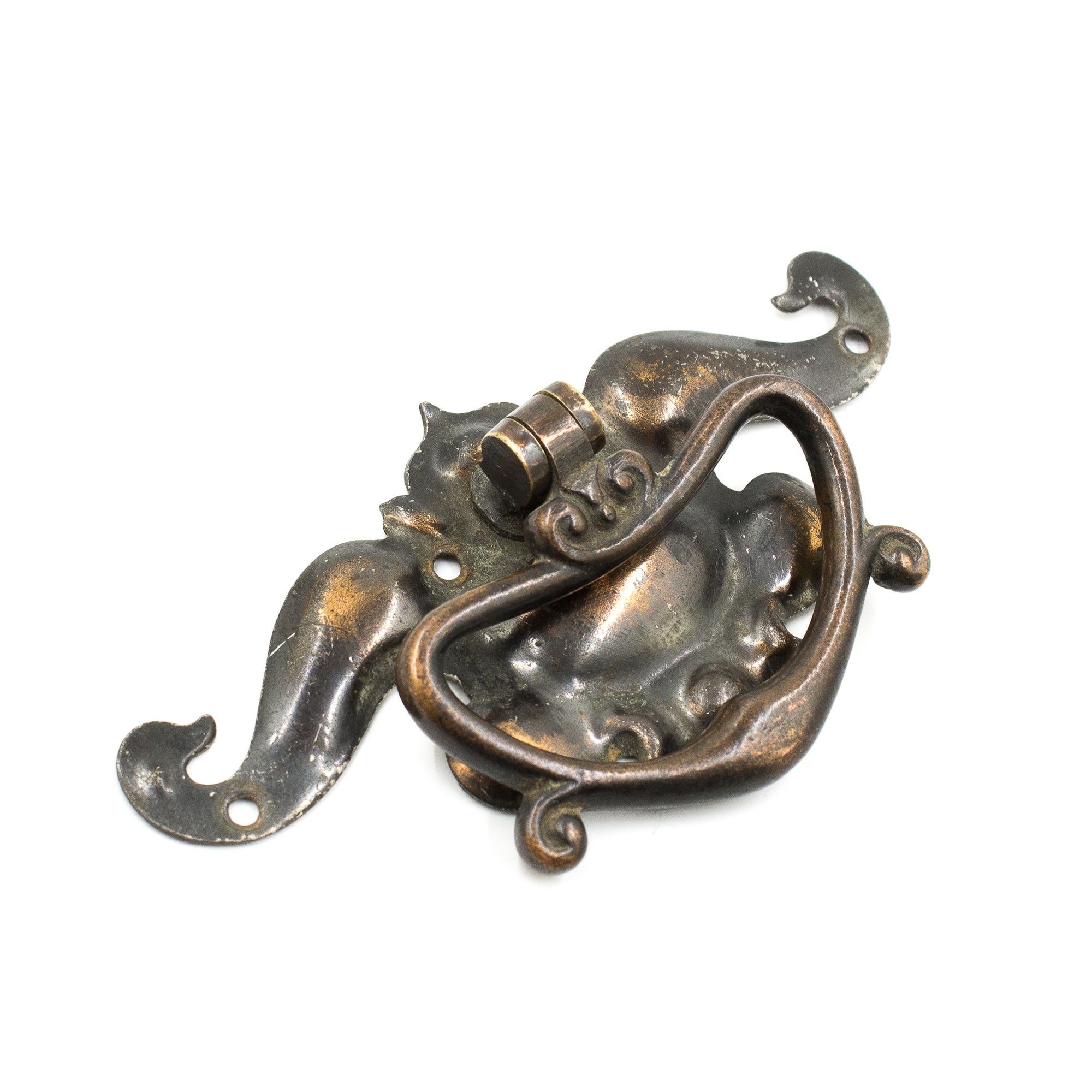 This is a vintage art nouveau drawer pull with a japanned finish