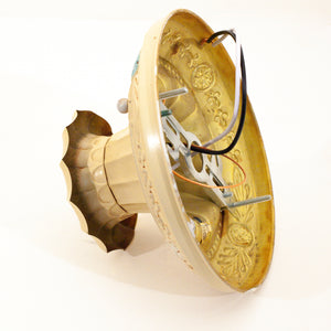 this picture shows a side angle view of a vintage bare bulb ceiling fixture. You can see the inside of the canopy with the wiring and the side of the base