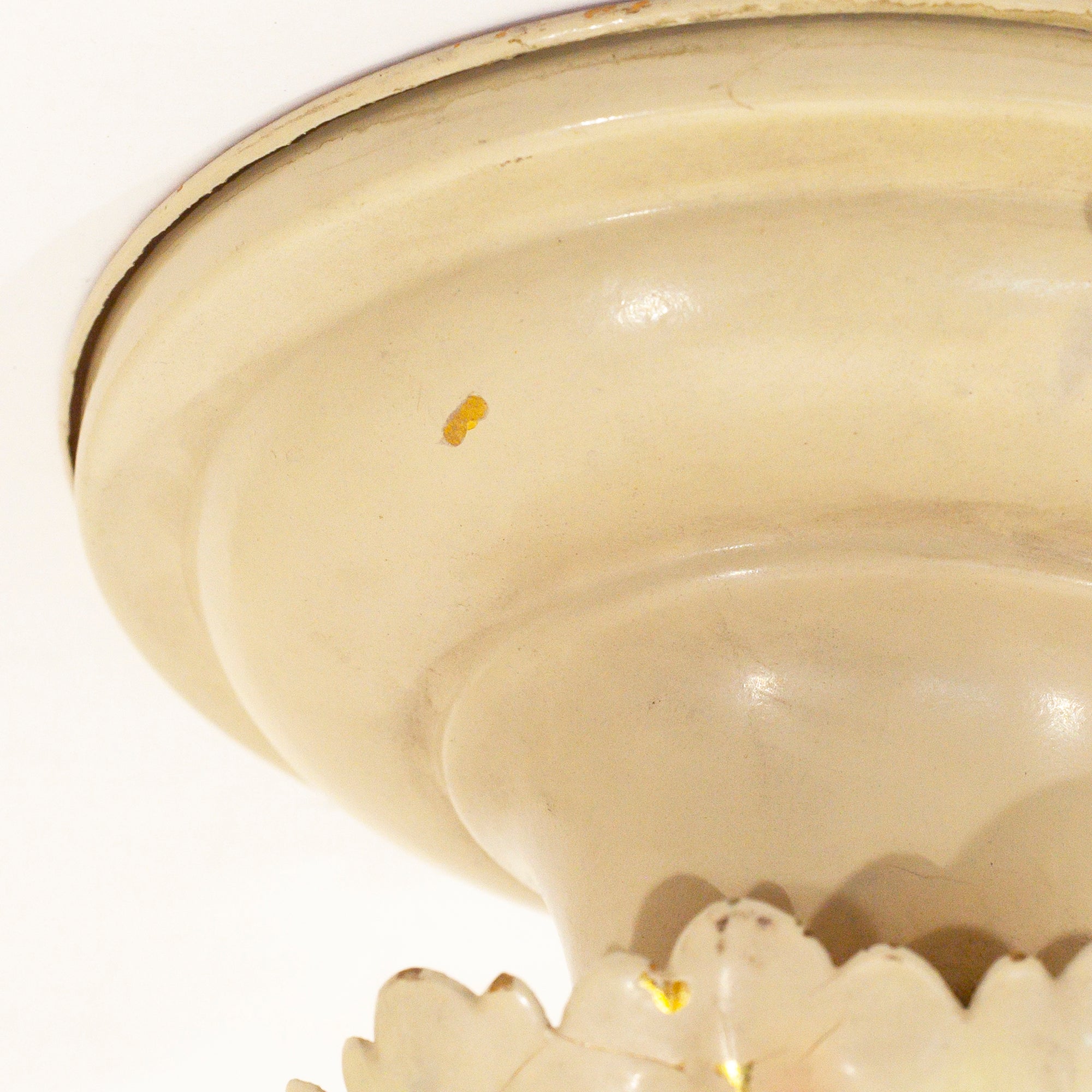 this picture shows a some minor paint chipping on the canopy of a vintage bare bulb light fixture