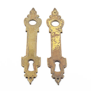 this is a pair of antique vintage brass escutcheons, one has heavy wear on it