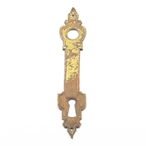 this is an antique vintage brass escutcheon with heavy wear on the finish